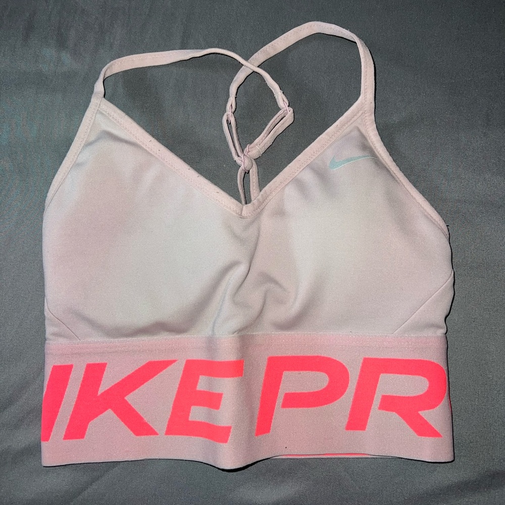 Pink Nike bro bra mid length